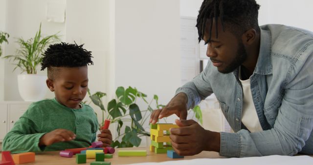 Father and Son Playing with Building Blocks at Home - Download Free Stock Images Pikwizard.com