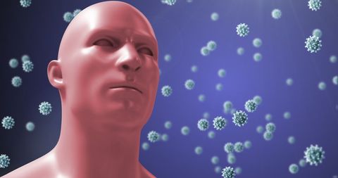 3d human head with floating covid-19 cells on blue background