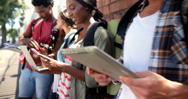 Young People Using Tablets Outdoors, Exploring City Together - Download Free Stock Images Pikwizard.com