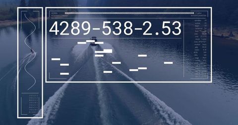 Cruising motorboat leaving twin wakes with futuristic hud readout over lake drone view