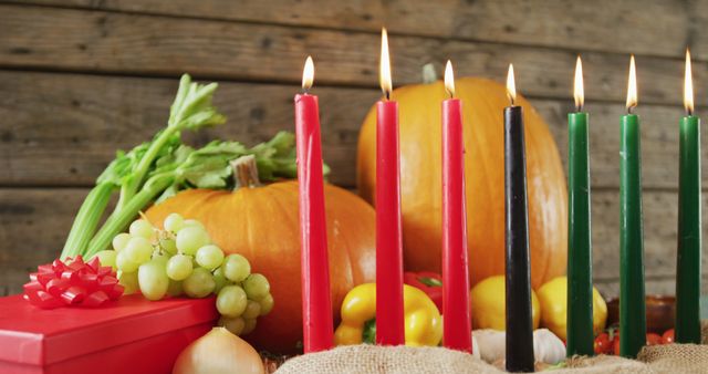 Kwanzaa Celebration with Kinara Candles and Harvest Decorations - Download Free Stock Images Pikwizard.com