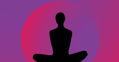 Silhouette of Woman Meditating with Radiant Circle Background