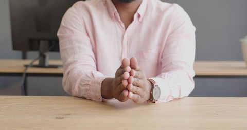Business Professional Gesturing at Office Desk during Meeting - Download Free Stock Images Pikwizard.com