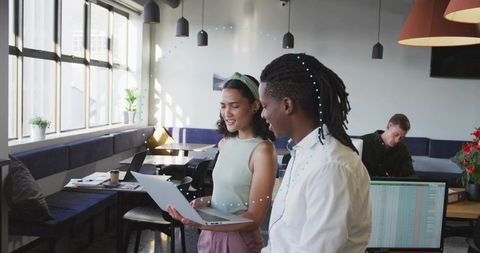 Modern office collaboration in creative workspace