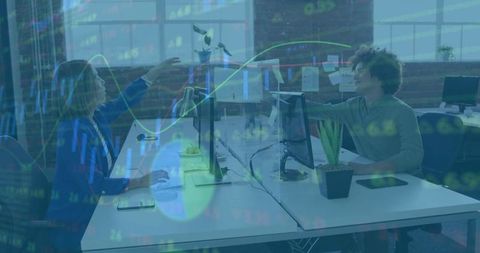 Colleagues Celebrating Success with Stock Graph Overlay