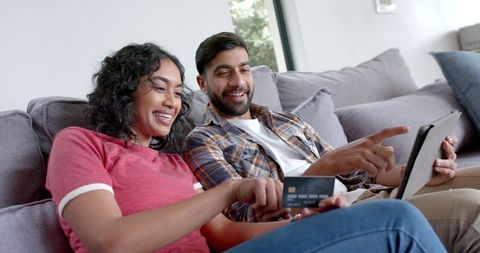 Smiling Couple Shopping Online Together with Tablet at Home - Download Free Stock Images Pikwizard.com