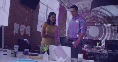 Collaborating in modern office setting with digital interface