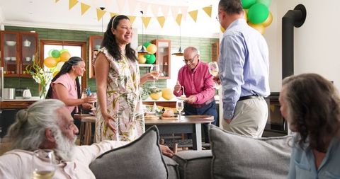 Multigenerational Family Celebration in Living Room
