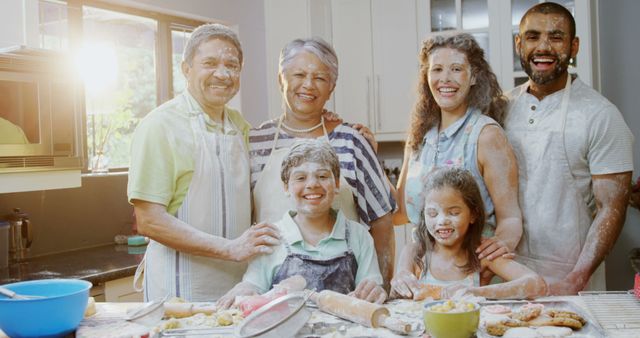 Diverse Family Baking Together in Sunny Kitchen with Flour and Smiling Faces - Download Free Stock Images Pikwizard.com