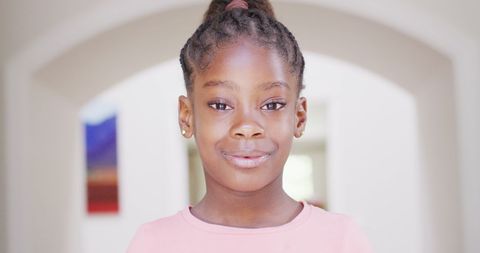 Cheerful African American Girl Smiling Brightly Indoors - Download Free Stock Images Pikwizard.com