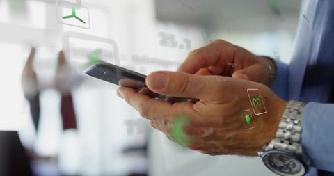 Executive Using Smartphone with Augmented Reality Overlays in Modern Glass-Walled Office