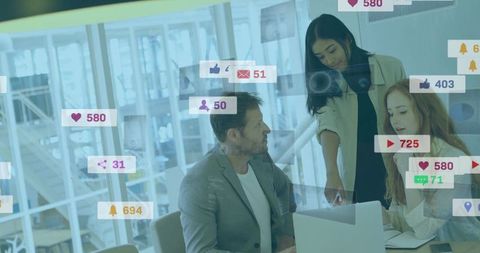 Business Team Analyzing Social Media Metrics in Modern Office