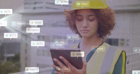 Construction Worker Engaging with Digital Technology on Site