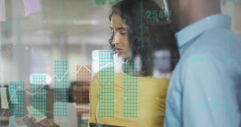 financial professionals analyzing charts in office environment - Download Free Stock Images Pikwizard.com