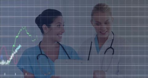 Female medical professionals engaging with digital health data