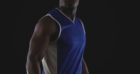 Athletic Male Basketball Player in Blue and White Jersey