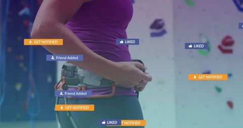 Woman preparing for climbing with digital notifications overlay