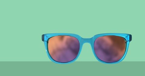 stylish blue sunglasses on vibrant teal background - Download Free Stock Images Pikwizard.com