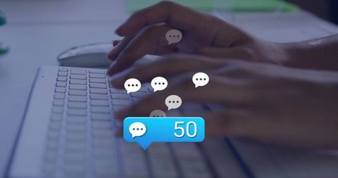 Typing woman's hands on white keyboard with 50-message chat bubble notification overlay