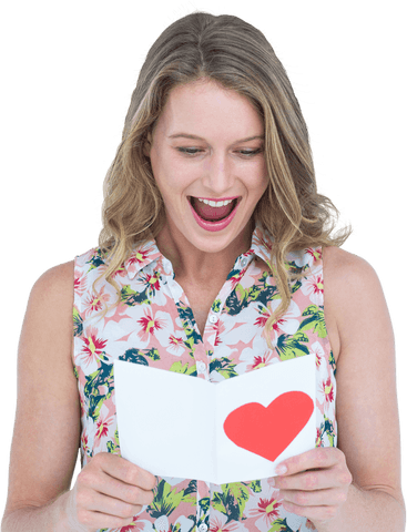 Woman expressing joy while reading transparent valentine card
