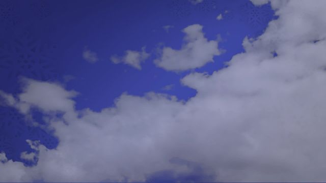 This compelling animation features a clear blue sky dotted with moving fluffy white clouds, creating a peaceful and serene atmosphere. Ideal for use in presentations, digital backdrops, website headers, or any project needing a tranquil, natural background. This animation can also be useful for weather forecasts, educational videos, and relaxation visuals.