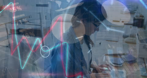 Businesswoman Analyzing Data with Futuristic Digital Interface