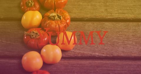 Assorted Tomatoes with Yummy Text Overlay