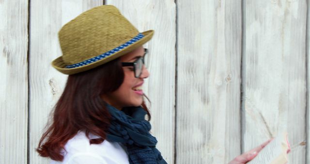 Stylish Woman with Hat and Scarf Smiling Outdoors - Download Free Stock Images Pikwizard.com