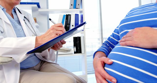 Pregnant Woman Visiting Doctor for Prenatal Checkup - Download Free Stock Images Pikwizard.com