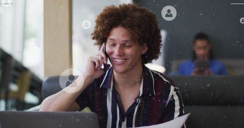 Biracial Professional Engaging in Global Communication via Smartphone