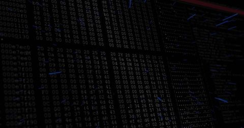 Stream of binary digits and hex values on monitor for cybersecurity