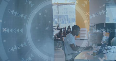 Tech-inspired businessman working in high-tech office