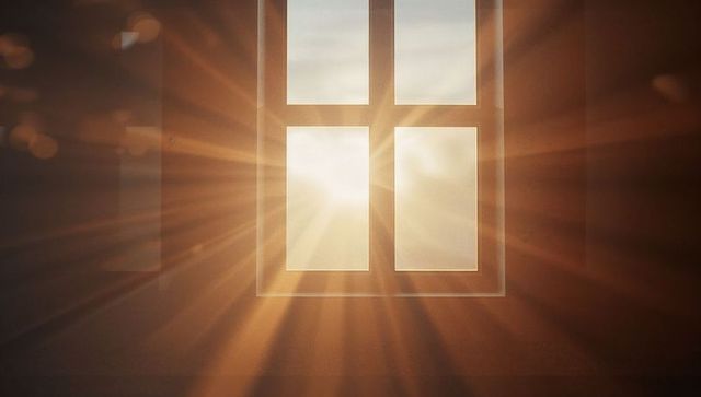 Sunlit Window Casting Warm Rays in Minimalist Room
