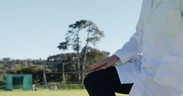 Medical Professional Standing on Outdoor Field with Trees - Download Free Stock Images Pikwizard.com