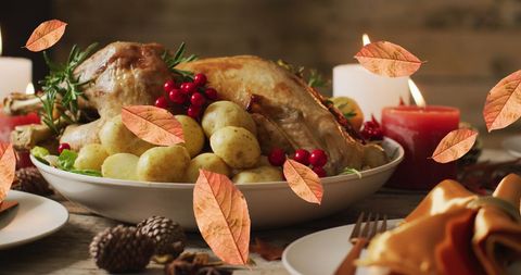 Thanksgiving Dinner with Leaves Falling Overlay - Download Free Stock Images Pikwizard.com