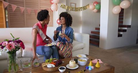 Couple Celebrating Birthday in Beautifully Decorated Living Room