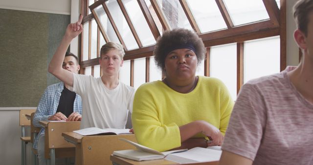 Diverse Students Participating Attentively in Classroom Setting - Download Free Stock Images Pikwizard.com