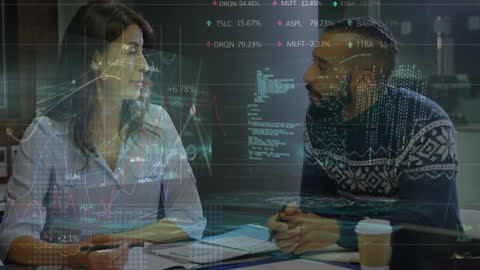 Innovative Businesspeople Analyzing Data with Digital Graphics Display