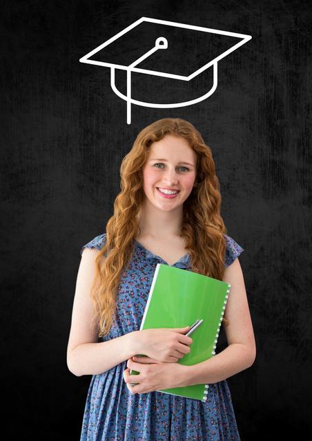 Digital composition of woman standing and holding book with graduation cap in background