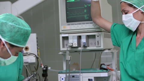 Surgeons Focused During Critical Operation in Sterile Environment