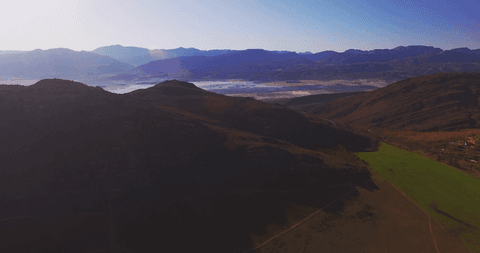 panoramic cloud-covered mountain landscape with transparent sky effect - Download Free Stock Videos Pikwizard.com