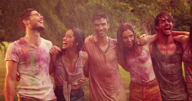 Happy Friends Celebrating with Colorful Holi Powder in Rain - Download Free Stock Images Pikwizard.com