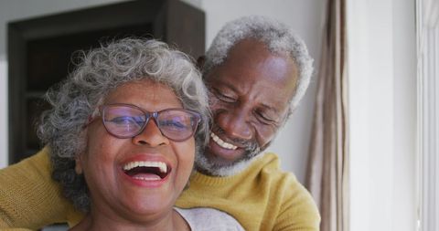 Joyful African American Senior Couple Smiling at Home