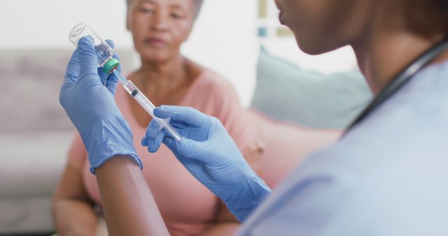 Nurse Preparing COVID-19 Vaccine Injection for Elderly Patient at Clinic - Download Free Stock Images Pikwizard.com