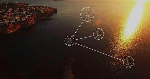 Aerial network illustration above scenic sunset coastline