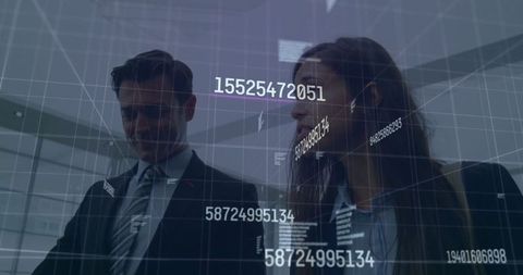 Business Professionals Engaged in Data Discussion with Futuristic Overlay