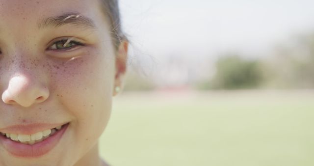 Close-up of Smiling Girl Outdoors in Sunlight - Download Free Stock Images Pikwizard.com