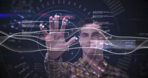 Caucasian man interacting with futuristic touch screen