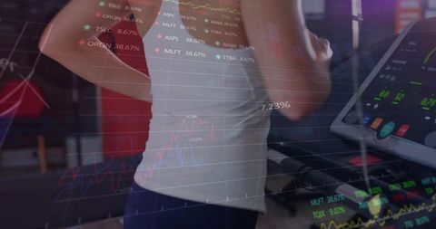 Mid Adult Woman Balancing Fitness and Finance While Exercising on Treadmill