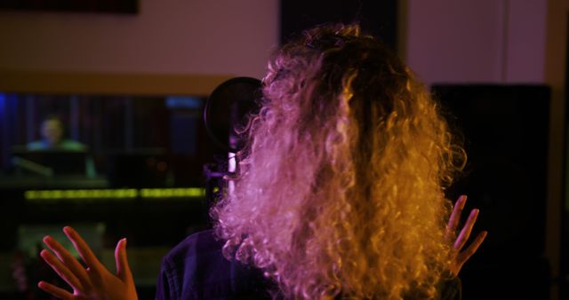 Female Singer Recording in Music Studio at Night - Download Free Stock Images Pikwizard.com